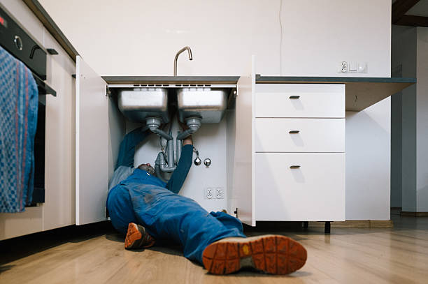 Professional Drain Cleaning technician working in Montello, WI